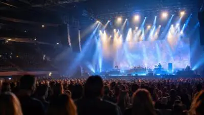 KI-generiertes Bild: Eine Konzertbühne mit Publikum und blau-weißer Beleuchtung.